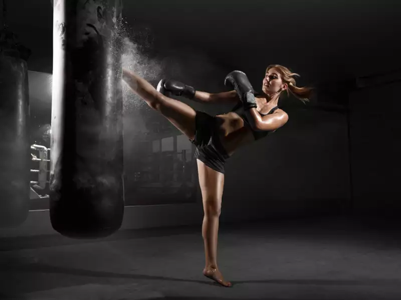 Woman Practicing Kick Boxing