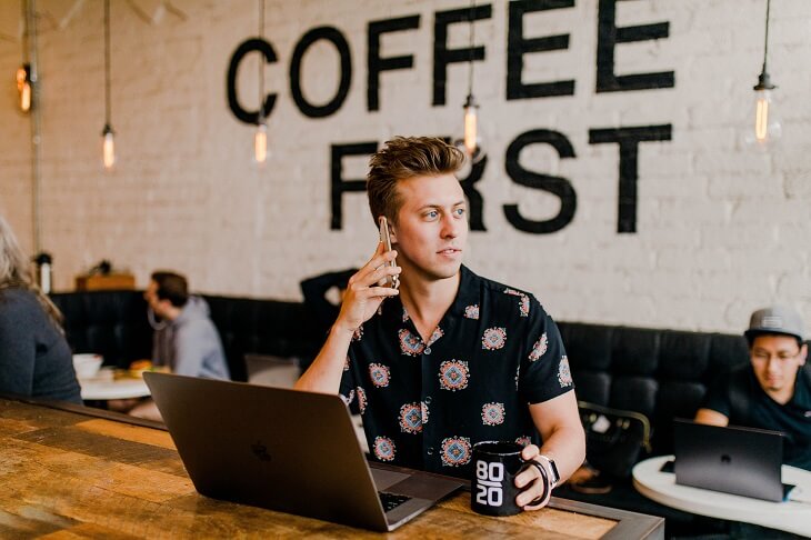 Man on Laptop Having Coffee - Entrepreneur