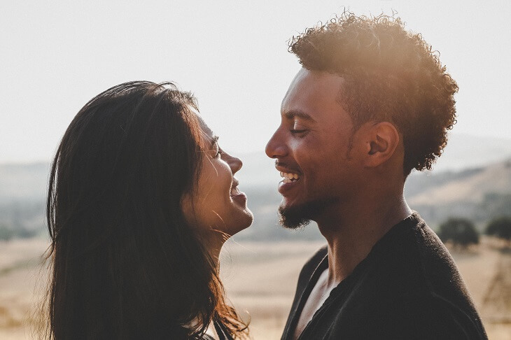 Couple Looking into Each Others' Eyes and Smiling